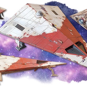 May include: A model of a red and white spaceship with a weathered look. The spaceship has a triangular shape and is on display against a purple and white galaxy background. The spaceship has the number "501-320" printed on the side.