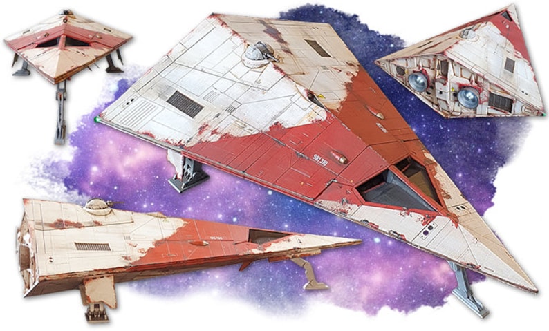 May include: A model of a red and white spaceship with a weathered look. The spaceship has a triangular shape and is on display against a purple and white galaxy background. The spaceship has the number "501-320" printed on the side.