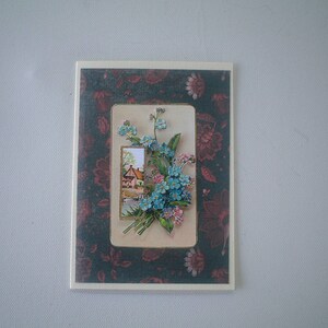 Carte de voeux paysage avec myosotis