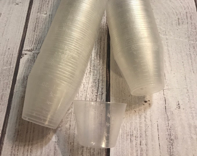 100 - 1 oz measuring cups