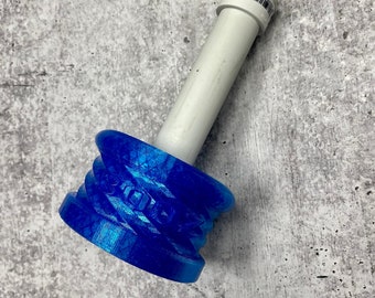 May include: A blue plastic pipe fitting with a white threaded pipe attached to it.