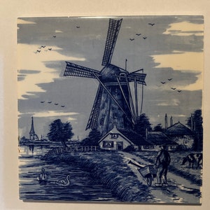 Dutch vintage blue and white Delft tile. Collectable item.