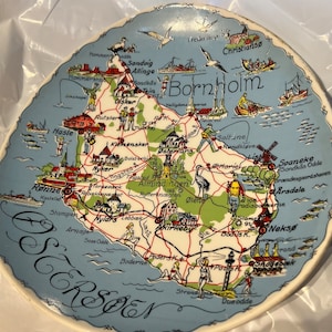 A decorative and rare plate, with map decor from the island BORNHOLM, Østersøen, Denmark.