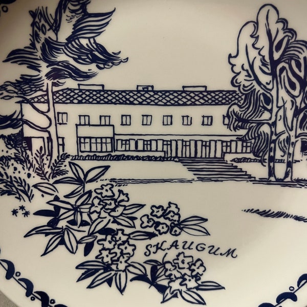 A vintage blue and white Figgjo ( wall) plate with decor of SKAUGUM, the Norwegian Crown Prince family home, outside Oslo. Norway.