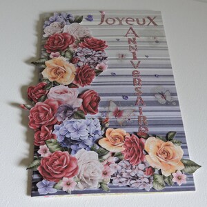 Biglietto di compleanno intitolato: "Belle rose multicolori..."