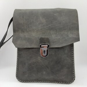 Vieille sacoche outlet en cuir