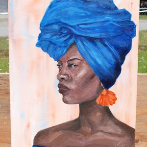May include: A painting of a woman with dark skin wearing a blue turban and a large orange earring. The background is a light peach color.