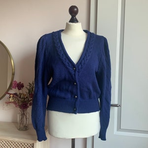 Traditional cardigan with braid pattern