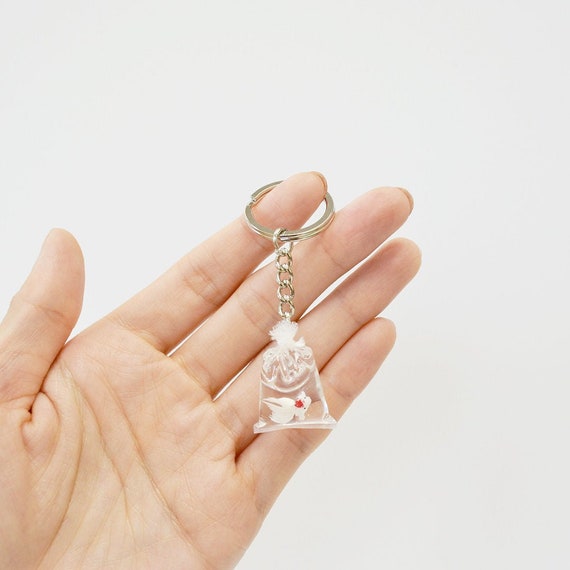 Goldfish in a store bag keychain