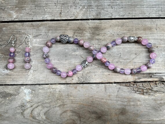 Rhodonite and amethyst together deals