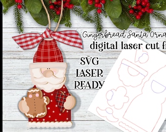 May include: Gingerbread Santa Ornament digital laser cut file SVG LASER READY. A red and white plaid bow sits on top of a gingerbread Santa holding a gingerbread man. The image also shows a laser cut file of the ornament.