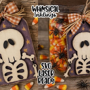 May include: A purple wooden tag featuring a light-colored skeleton cutout with black oval eyes, adorned with an orange and white gingham bow and raffia. The tag is decorated with yellow stars and includes the text Whimsical Inklings and SVG Laser Ready.