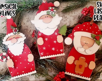 May include: Three wooden Santa Claus ornaments with red and white paint, decorated with snowflakes, holly, and a candy cane. The ornaments are ready to be cut with a laser cutter. The text "Whimsical Inkling" and "SVG Laser Ready" is visible in the image.