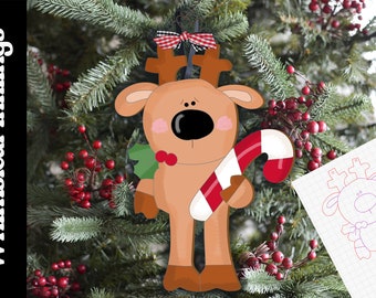 May include: A brown wooden reindeer ornament with a red and white candy cane, green holly, and a red and white checkered bow. The ornament is hanging on a Christmas tree.