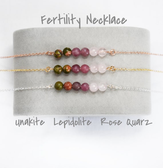 Fertility crystal best sale necklace