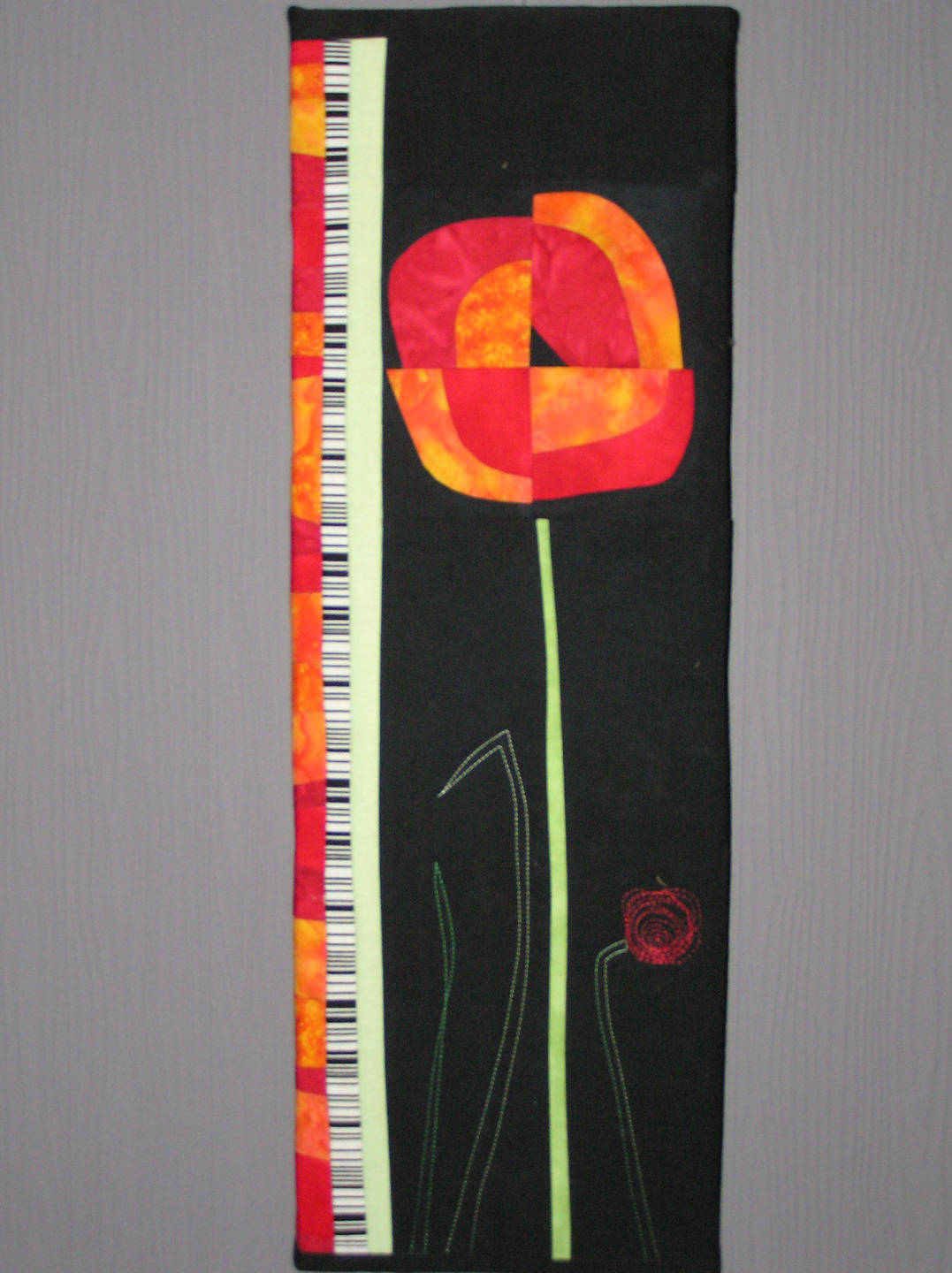 Tableau Fleur en Patchwork sur Châssis Bois