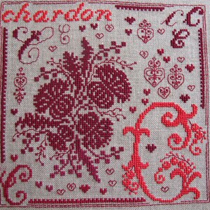 C as two-tone red Thistle embroidery