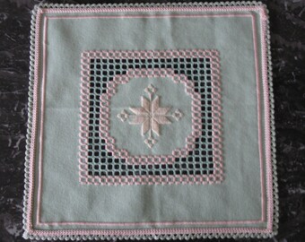 Square doily embroidered in green Hardanger and salmon