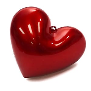 May include: A glossy, heart-shaped ornament in a vibrant red hue. The ornament has a smooth, reflective surface and a small loop at the top for hanging. The heart is a classic symbol of love and affection.