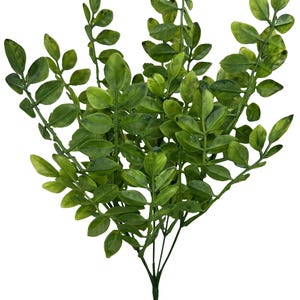 May include: A vibrant green artificial plant with multiple stems and small, oval-shaped leaves. The leaves have a naturalistic appearance with variations in color, adding depth and realism to the faux foliage. The plant is suitable for home decor.