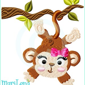 May include: A brown monkey with a pink bow hanging upside down from a tree branch. The monkey has large eyes and a smiling expression.