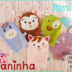 May include: Five colorful animal hand puppets made from soft, textured fabric. The puppets include a donkey, monkey, dog, cat, and bat. The puppets are designed for children and are perfect for imaginative play. The text "Stickrahmen 13x18 Hoop 5x7" is visible in the image.