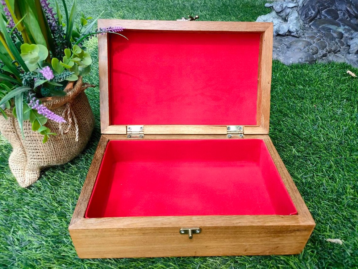 Jewelry box made of teak lined with red velvet fabric. Etsy