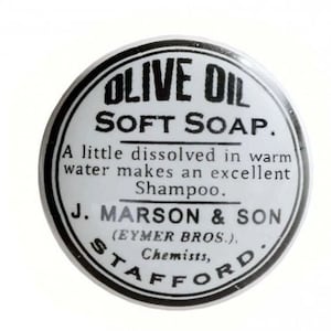 May include: A black and white round label with the text "OLIVE OIL SOFT SOAP."  The label also includes the text "A little dissolved in warm water makes an excellent Shampoo. J. MARSON & SON (EYMER BROS.). Chemists, STAFFORD."