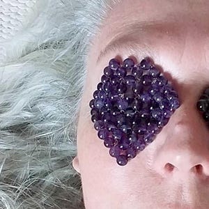 Soothing eye masks made of handwoven Myanmar jade or amethyst beads. Natural, undyed stones.