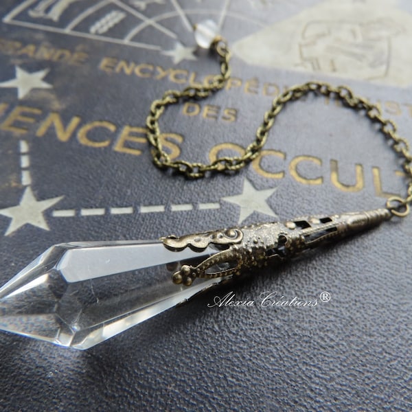 Pendule Divinatoire avec pointe de verre facetté transparent et perle en cristal de roche.