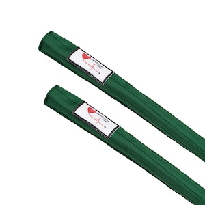 May include: Two dark green cylindrical medical device covers. Each cover has a white label with a red heart and a line graph, and the text "LVAD Gear .com". The covers are made of a ribbed fabric.
