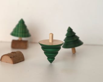 Christmas tree spinning top and log