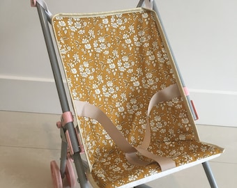 Liberty coated doll stroller cover.