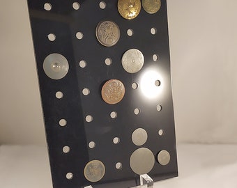 Black plexiglass display for collectible buttons