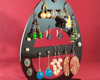 Plexiglass display for earrings and piercings