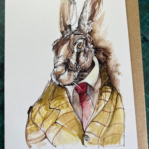 Lepre in costume da lepre! Realizzato utilizzando la mia illustrazione originale a inchiostro. Carta artistica vuota.