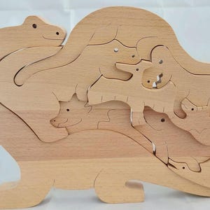 Dinosaur family solid beech wood puzzle.