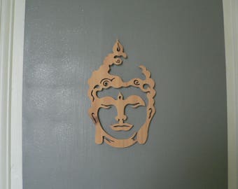 Head of Buddha in woodcut