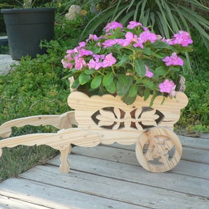 Small cut-out wooden wheelbarrow for decoration Ideal as a Mother's Day gift image 1