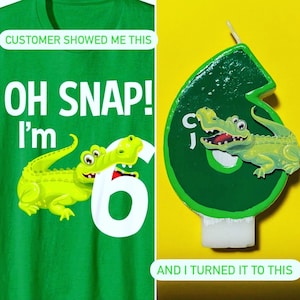 May include: A green t-shirt with the text "CUSTOMER SHOWED ME THIS" and "OH SNAP! I'm 6" with a green alligator graphic. Next to the t-shirt is a green and white birthday candle shaped like the number 6 with a green alligator graphic.