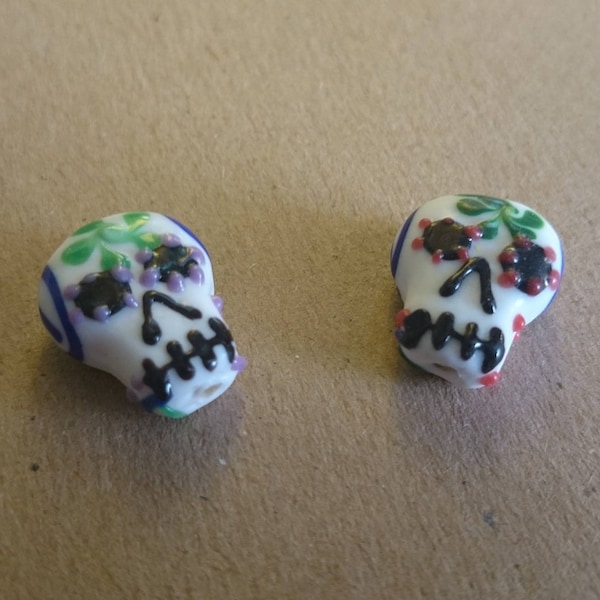 2 perles forme crâne calavera, tête de mort mexique en verre