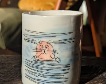 porcelain cups with animal designs