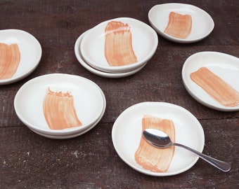 white earthenware dessert plates with orange touch