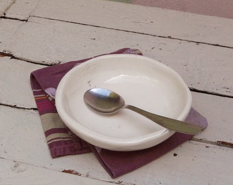 black-veined white earthenware soup plate