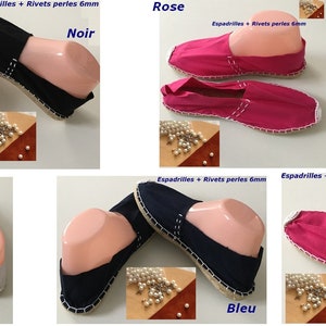 May include: Assortment of espadrille shoes in various colors, including black, white, pink, and blue. Each pair features a canvas upper, a woven sole, and decorative stitching. The text "Espadrilles + Rivets perles 6mm" is visible.