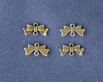 4 bowties connectors bronze