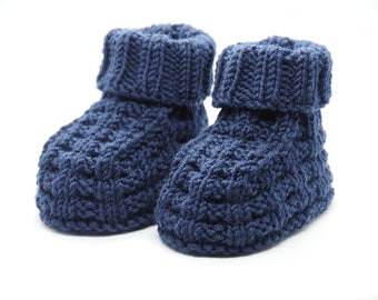 Knitted dark blue baby shoes made of soft wool, 3-6 months