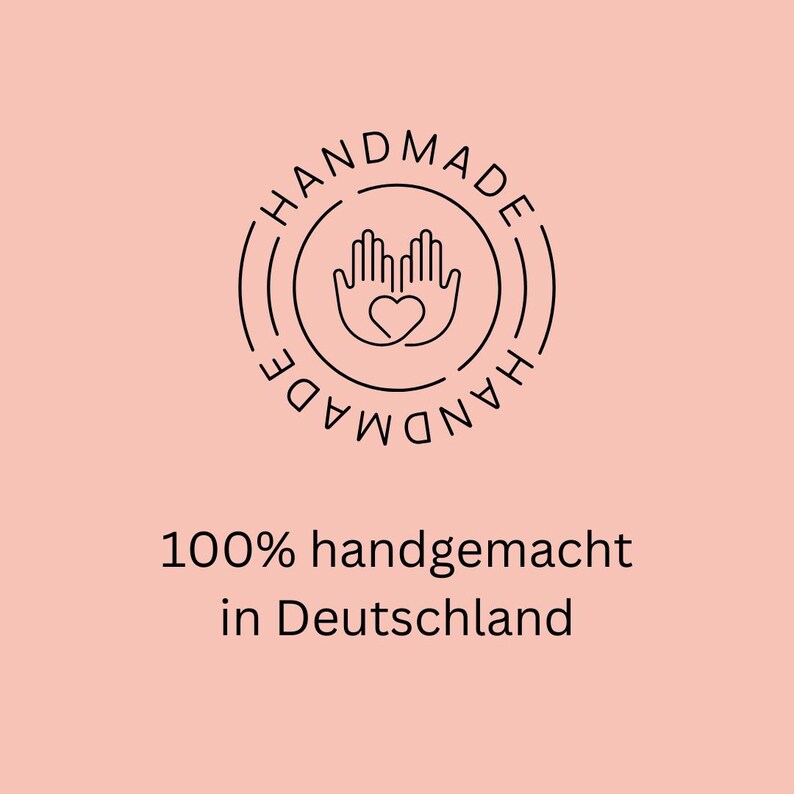 May include: Black and white logo with two hands holding a heart in the center of a circle. The text "HANDMADE" is written around the circle in a circular pattern. Below the logo, the text reads "100% handgemacht in Deutschland."