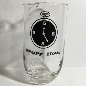 May include: A clear glass pitcher with a black and white design of a stopwatch with the text "Happy Hour".