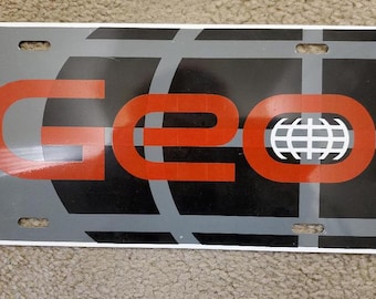 Vintage GEO Auto License Plate. New Chevrolet /GM Motors Geo Car Novelty License Plates. 1990&#39;s License Plate Chevy Geo